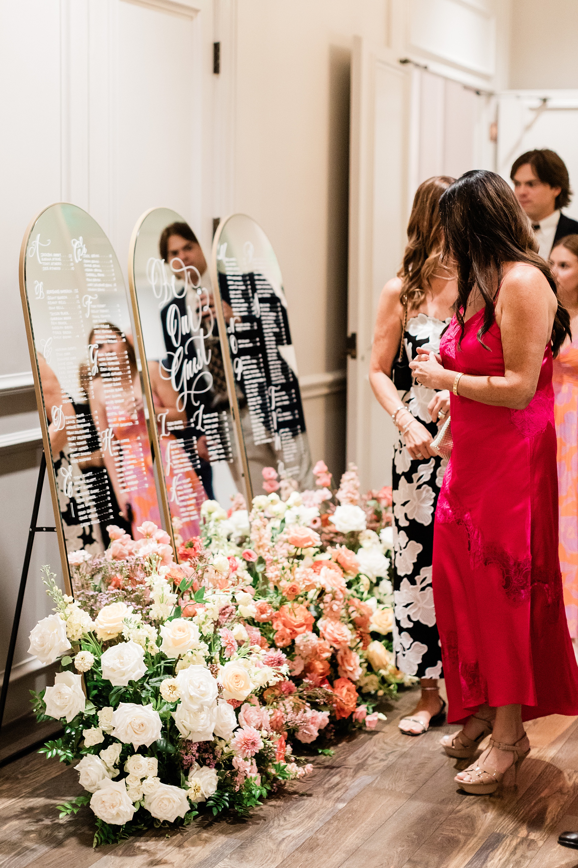 hand-lettered mirrored seating chart 