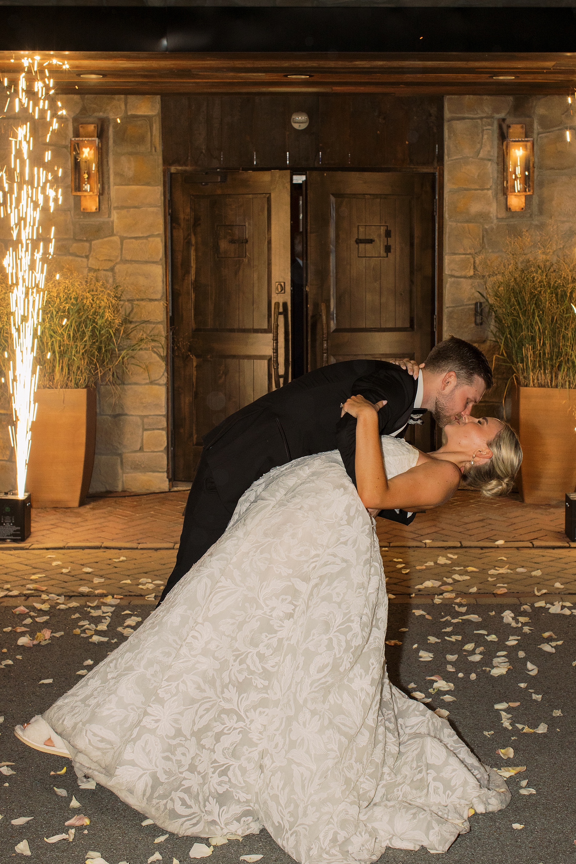 newlyweds kiss during wedding exit 
