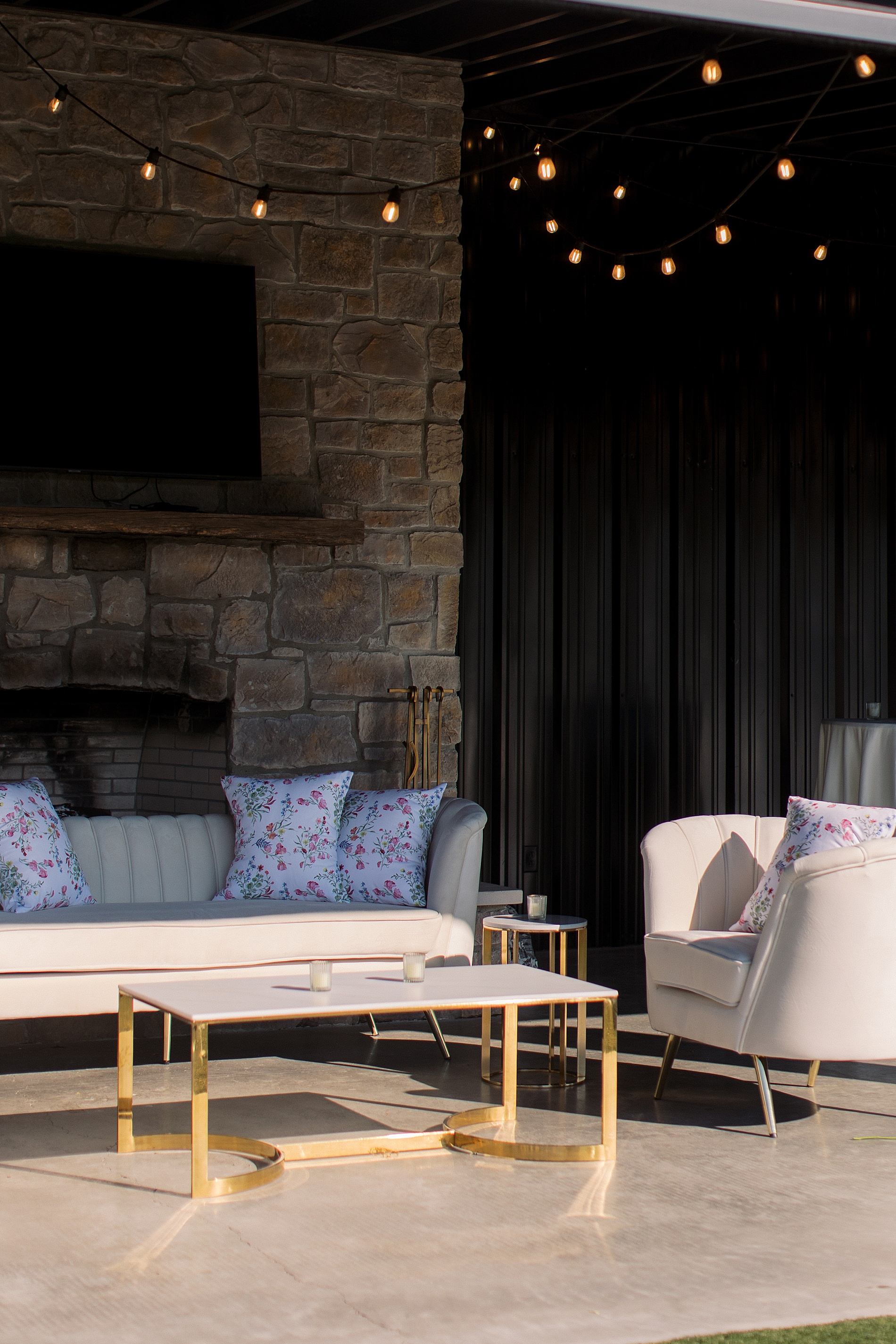 seating area with pillows featuring floral artwork from envelope liners 