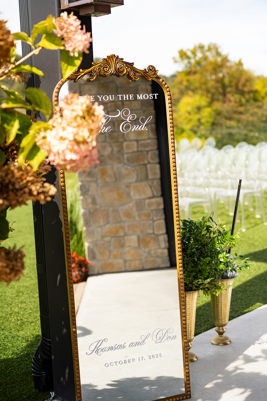 mirrored wedding sign framed in gold