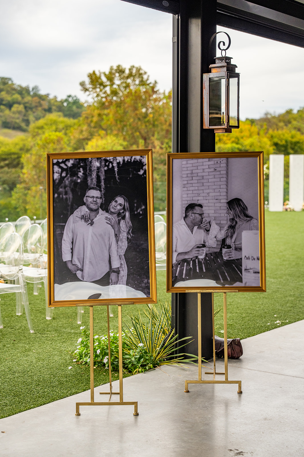 gold framed photos of couple at reception 
