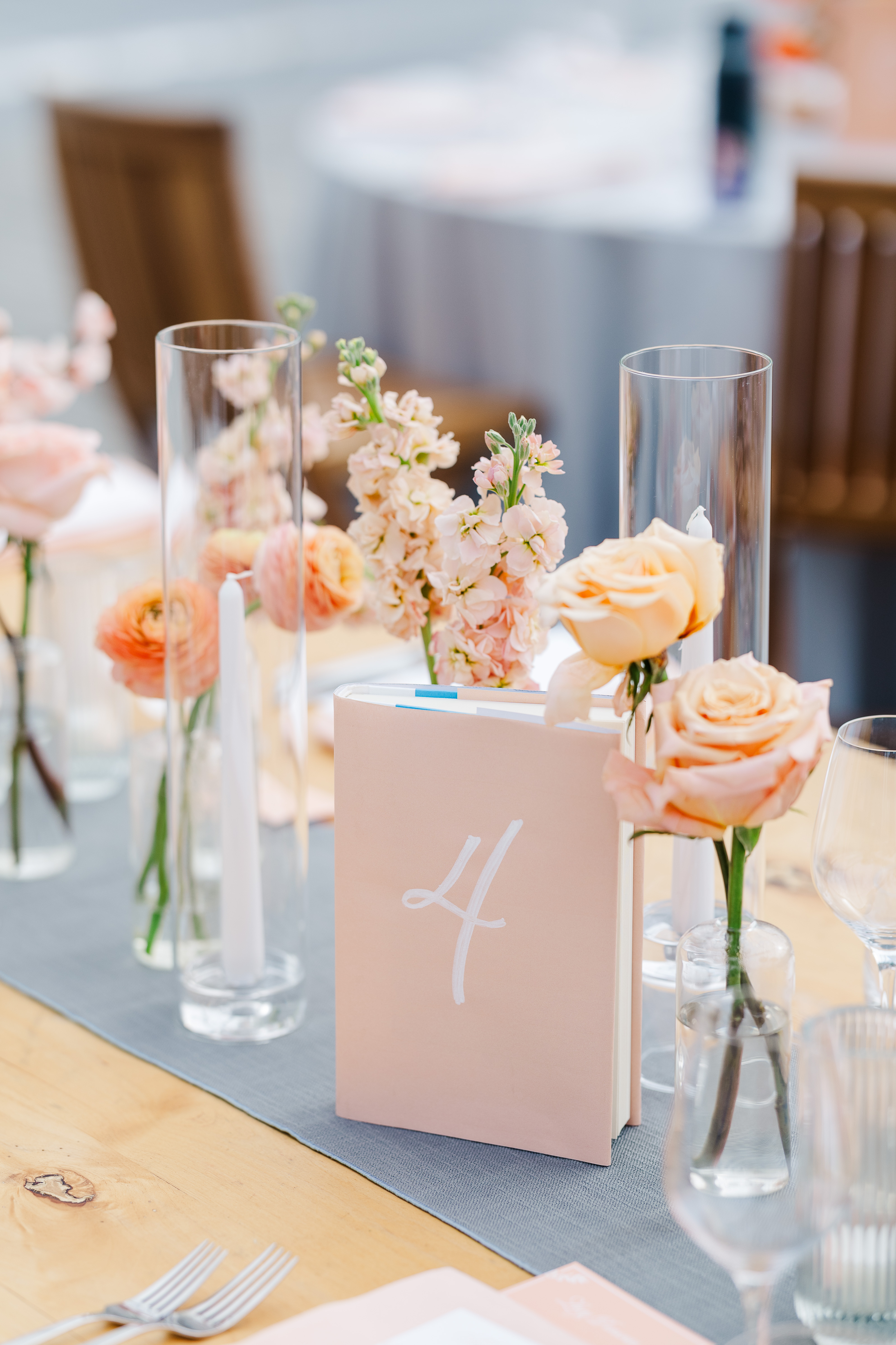 books in pale orange color with table number on front