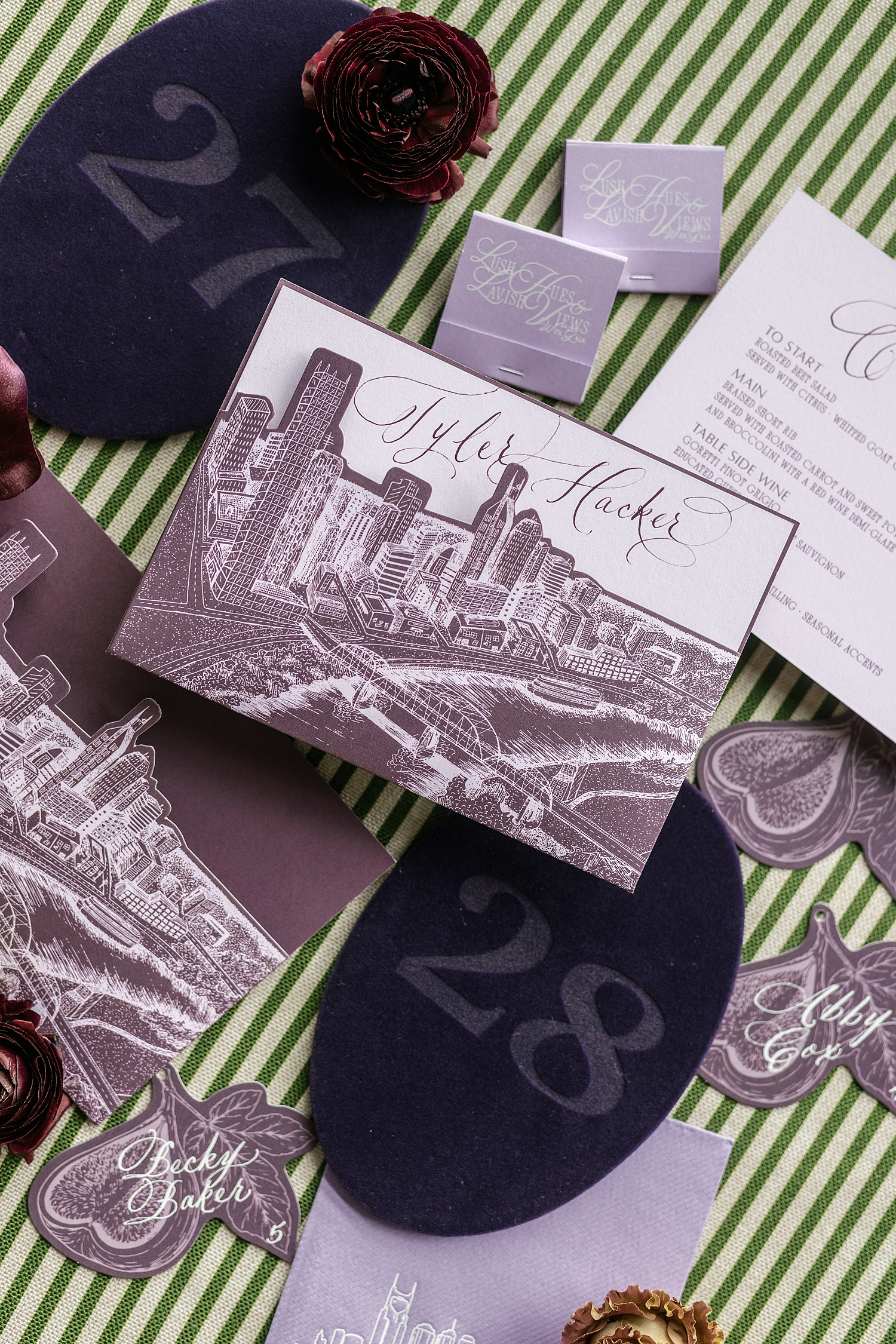 die cut custom menu pockets with Nashville Cityscape design | elevated event details by White Ink Calligraphy 