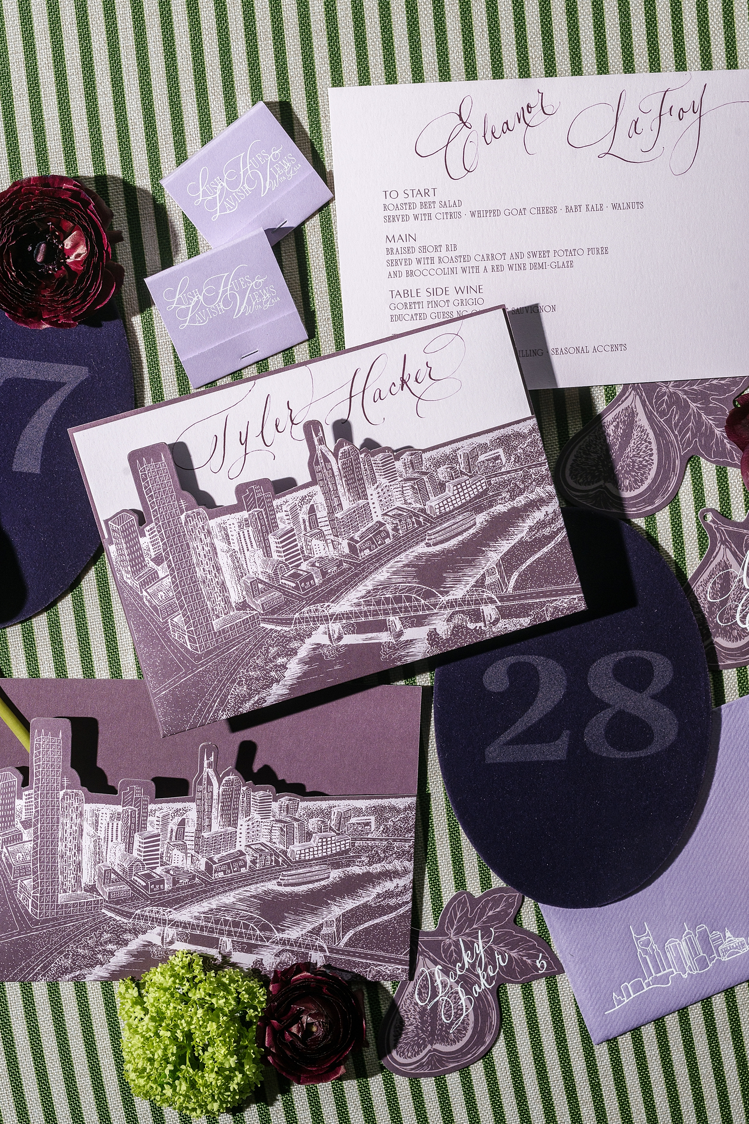 die cut custom menu pockets with Nashville Cityscape design | elevated event details by White Ink Calligraphy 