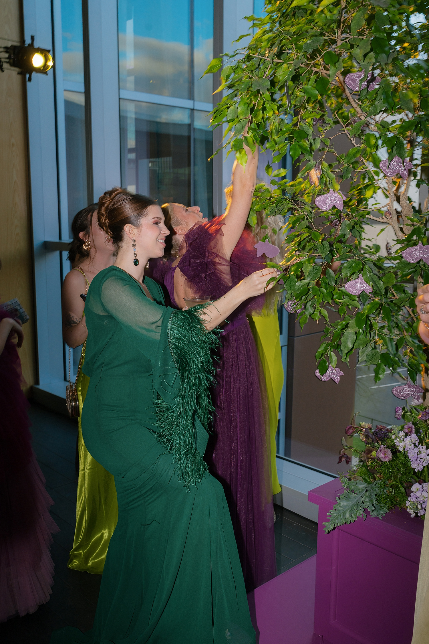guests find their seating card hanging from tree at WIPA Gala in Nashville 