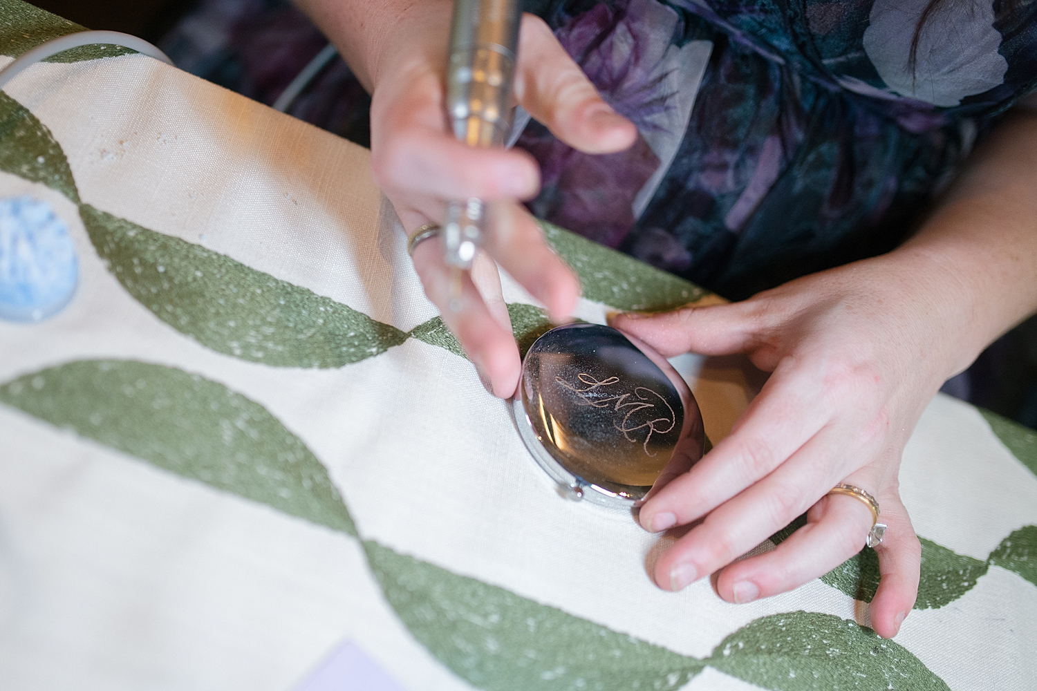 compact mirror engraved onsite for guests 