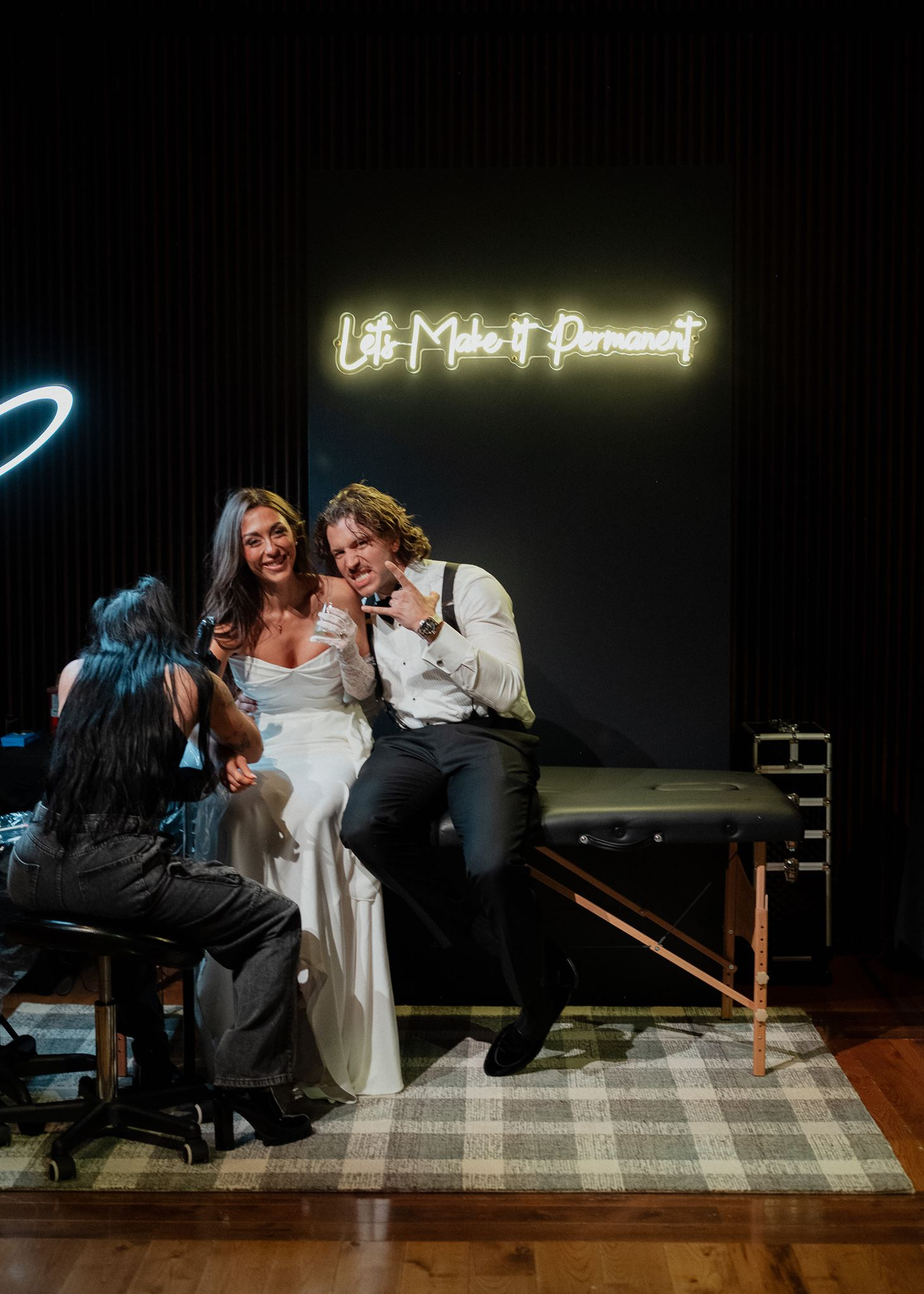 bride and groom getting tattoo at Classic black and white wedding at Country Music hall of Fame