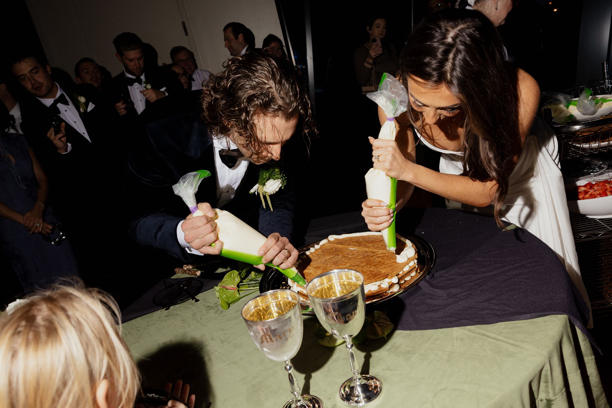 custom engraved wine goblets on cake table in old world script 