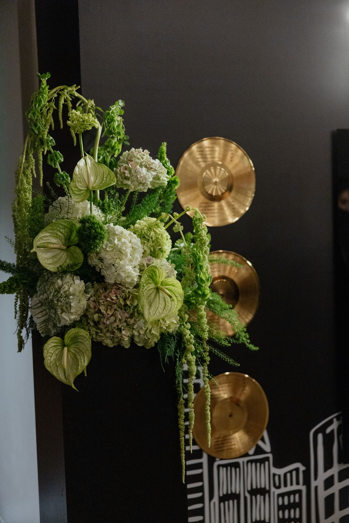 gold vinyl record displaying seating assignments at Music City wedding at Country Music Hall of Fame