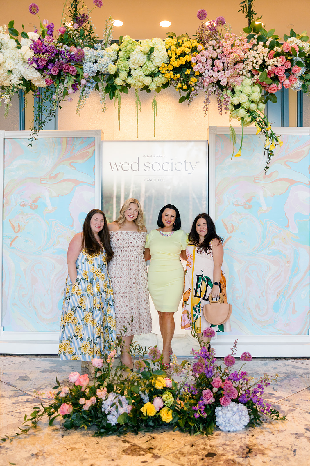 Wed Society Nashville Book of Weddings Event with Marble Artwork and Swan Details