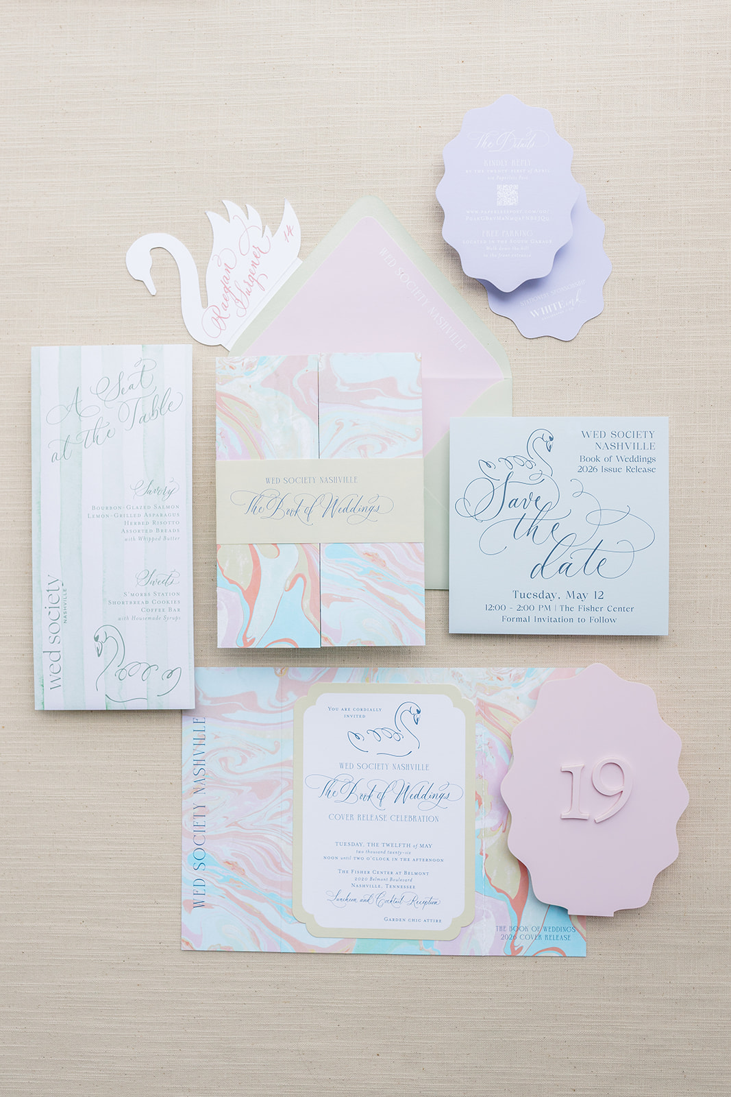 Wed Society Nashville Book of Weddings Event with Marble Artwork and Swan Details
