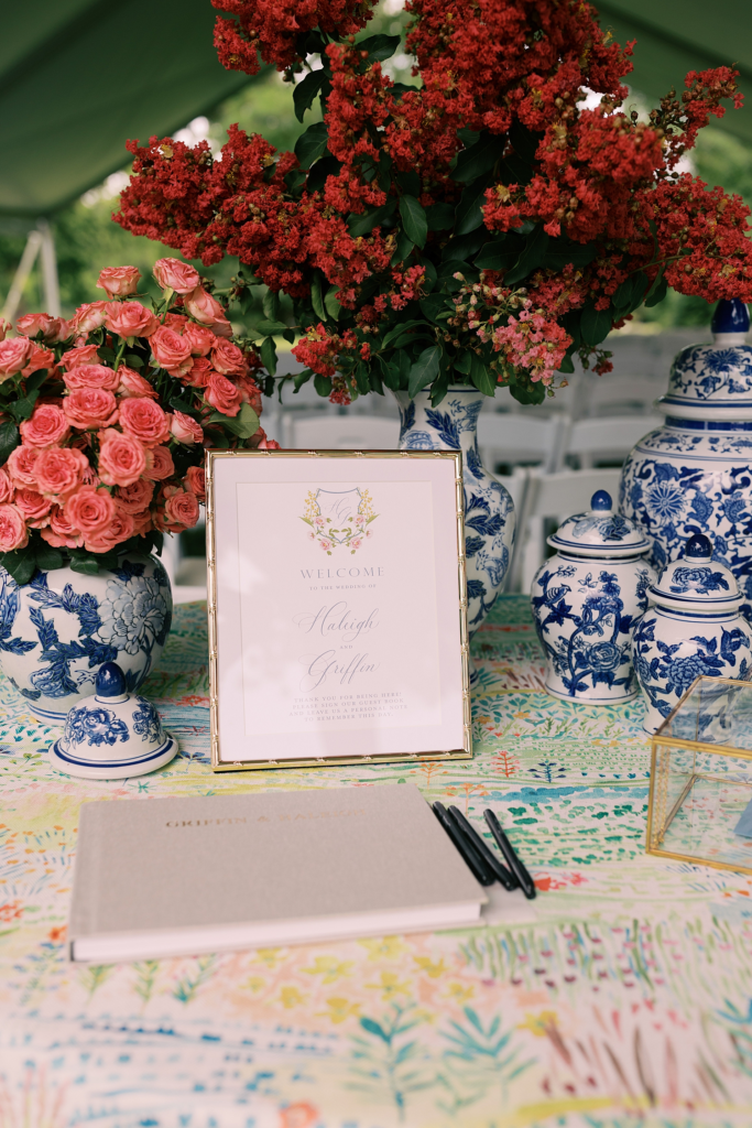 gold-framed sign on welcome table
