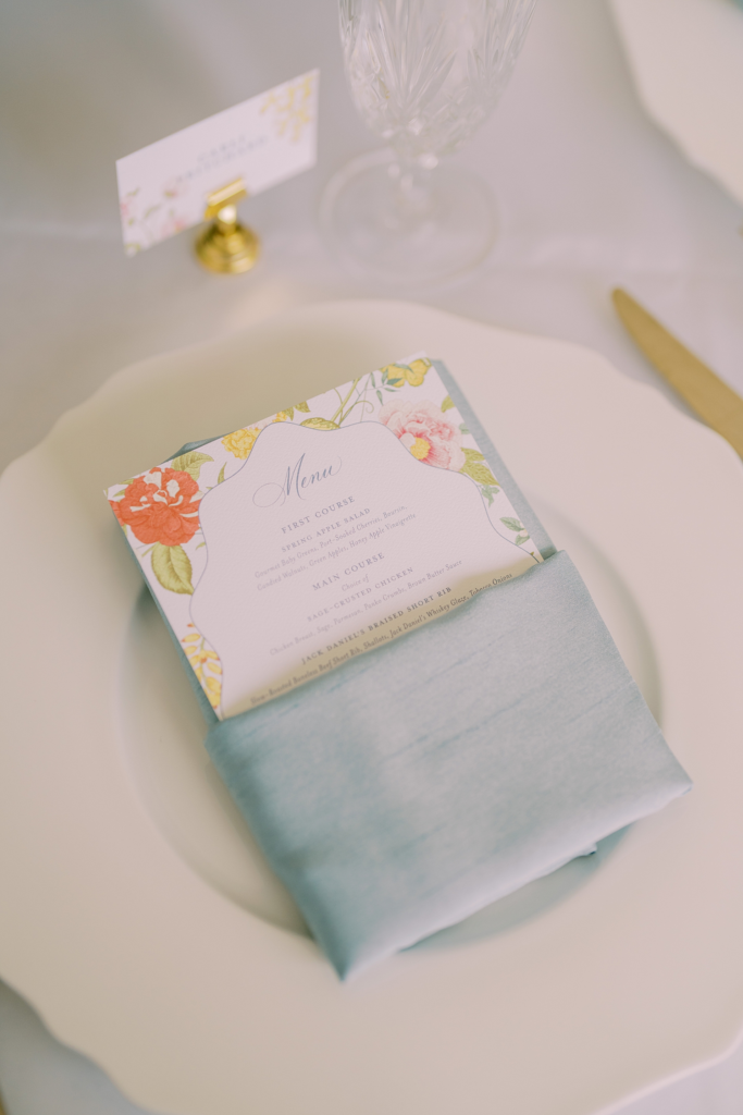 menus and place cards in gold base